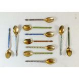 A set of eleven silver gilt and enamel coffee spoons by J Tostrup