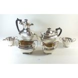 A four piece silver plated tea service including teapot, coffee pot, milk and sugar plus a silver