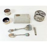 A silver cigarette case and other items