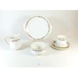 A Paragon Belinda tea service comprising six cups and saucers, jug, sugar, six tea plates, six