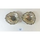 A pair of silver heart shaped pin dishes with pierced and embossed decoration 38g Birmingham 1898