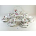 A Rosina 'Mottisfont Abbey' part tea service comprising six cups and saucers, jug, cake plate and