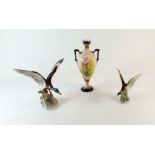 An Austrian pottery floral painted vase together with two Austrian 'Royal Belvedere' ducks in