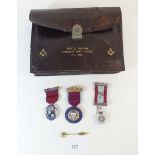 Three silver Masonic jewels cased, a 9ct gold stick pin with signed documentation and a leather
