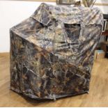 Collapsible hide seat in Oak leaf camo print