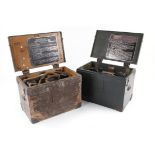 Two WWII field telephones in original wooden transport boxes
