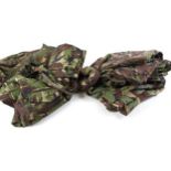 Three camo smocks, light camo jacket (size 38), two pairs camo trousers (sizes 34, 36), in camo