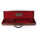 Leather motor case with claret baize lined fitted interior for 30 ins barrels, William Evans 63 Pall