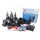 Six Motorola two-way radio sets with chargers, together BT and Telcom handsets