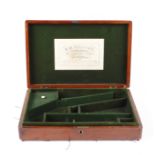 Mahogany pistol case with green baize fitted interior, E.M.Reilly & Co. trade label, 14 ins x 9¼ ins