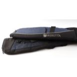 Two Beretta foam padded canvas gun slips