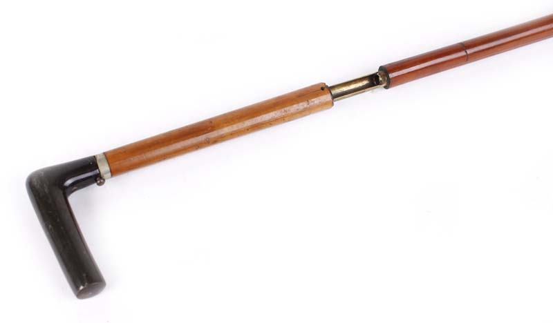 S58 7mm(cf) Walking stick shotgun with stepped malacca cane shaft, white metal collar stamped D R,