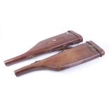 Two good leather leg o' mutton gun cases