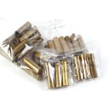 A quantity of once fired 12 bore brass cases: 24 x Kynoch Patent; 9 x Eley Kynoch I.C.I.; 3 x Eley