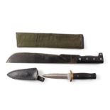 Modern machete with 13 ins steel blade, metal studded black plastic grips in canvas sheath; Japanese