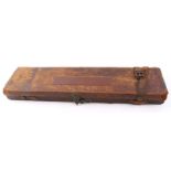 Red leather gun case, handle to hinge side, Holland & Holland trade label,