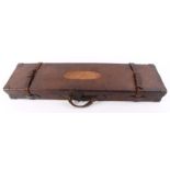 Leather motor case with brass corners, claret baize lined fitted interior for 30 ins barrels