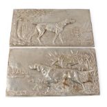 Two metal plaques of a Setter and Pointer,
