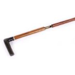 S58 7mm(cf) Walking stick shotgun with stepped malacca cane shaft, white metal collar stamped D R,