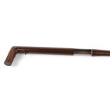 S5/S2 20 bore English walking stick shotgun, hardwood handle with recess for shoulder stock, brown
