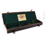 Black canvas gun case with green baize lined interior for 30 ins barrels, Watson & Hancock trade