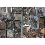 Two trays of mixed gun spares, parts and fixings to include: triggers; trigger guards; levers;