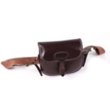 Brown leather cartridge bag, tan webbing strap