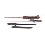 Enfield bayonet with leather frog, Mauser bayonet with scabbard, and another bayonet (3)