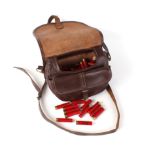 (S2) Leather cartridge bag with 100 x 32 bore Fiocchi cartridges [Purchasers Please Note: Section