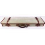 Brady green canvas and leather gun case, maroon baize lined fitted interior for 29 ins barrels, with