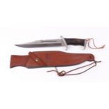Rambo III survival knife by Hibben Knives, 11 ins blade, wood grips, in fitted heavy leather sheath