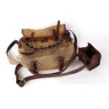 Tan canvas game bag with leather strap, with brown leather cartridge box on belt; Brady leg o '