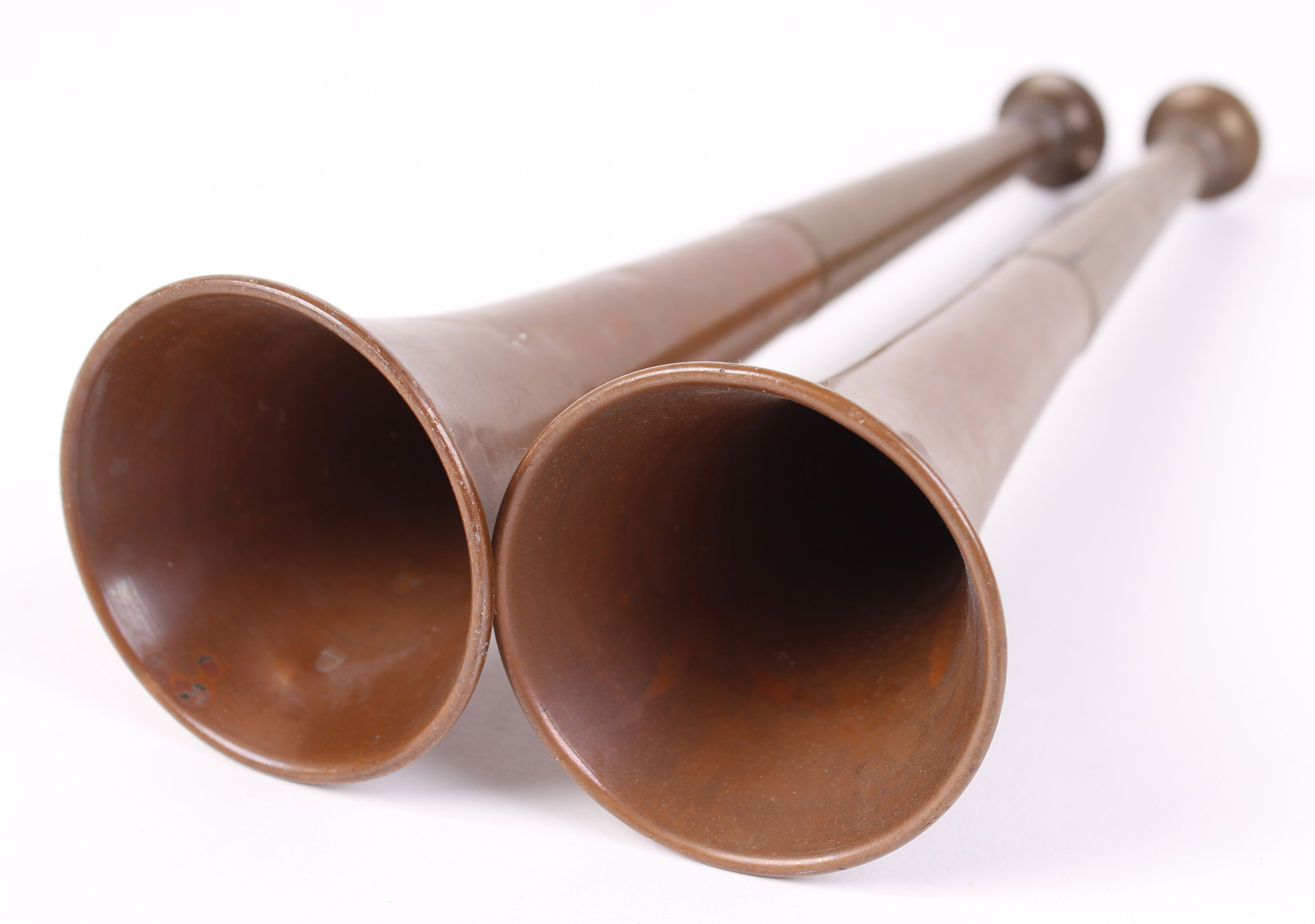 Two brass hunting horns