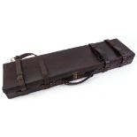 Brown leather gun case, stamped G.H.P, green baize lined interior fitted for up to 28 ins barrels,