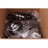 Box containing quantity of various gun spares: Recoil pads; Action forgings; Springs and pins;