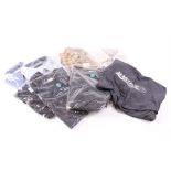 Box containing men's checked shirts and t-shirts