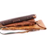 Two leather leg o' mutton gun slips; canvas and leather leg o' mutton case