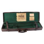 Leather gun case with green baize lined fitted interior for 30½ ins barrels, Charles Lancaster trade
