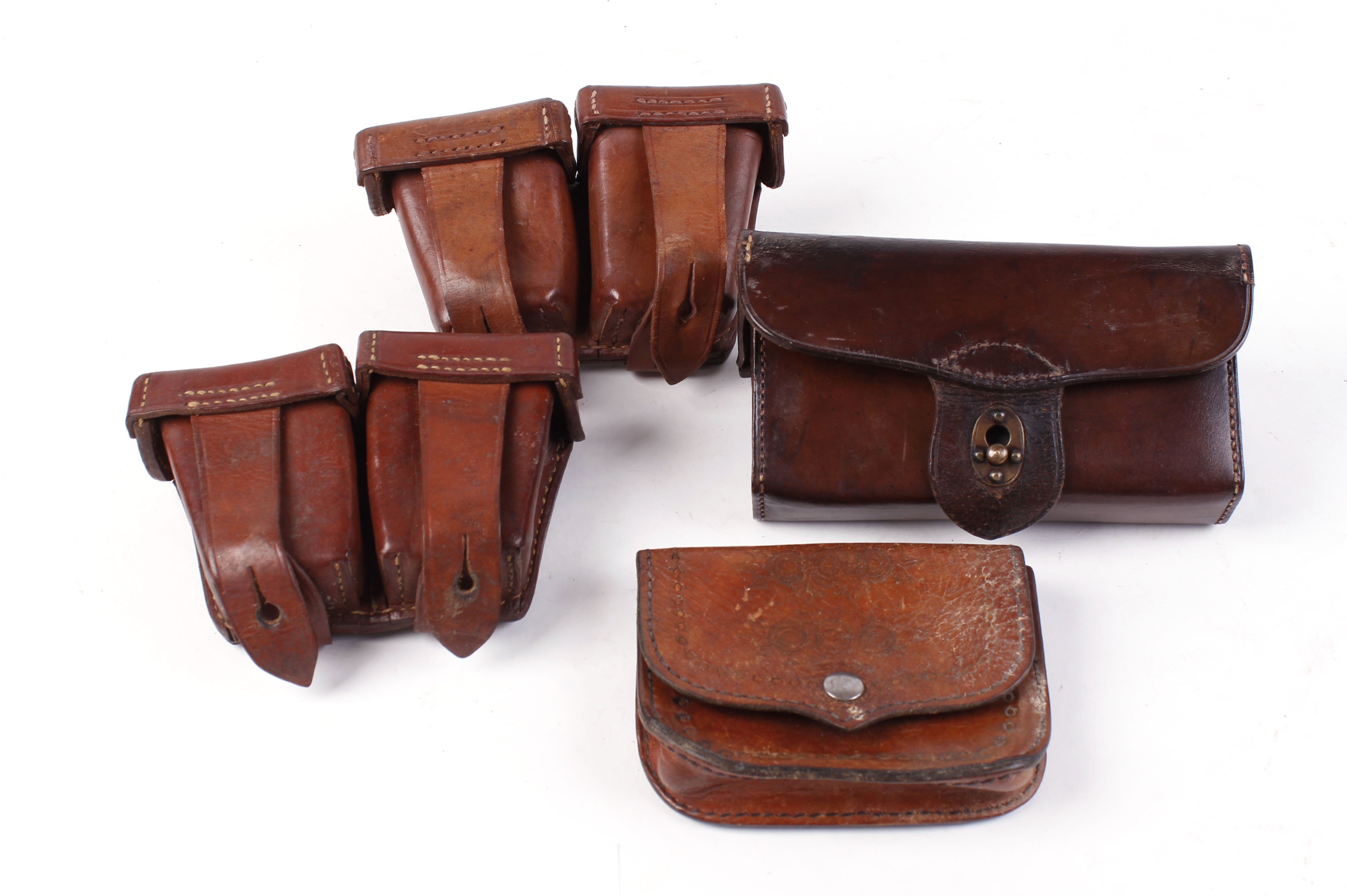 Four leather ammunition pouches