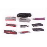 Ten pocket knives including Buck lock, Opinel, Victorinox, and Leatherman