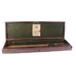 Mahogany gun case for refinishing, with inset brass corners and ring handle, green baize lined
