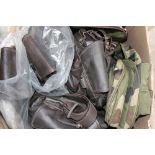 Box containing five leather satchel style rucksacks, camouflage rucksack, and fleece lined pistol