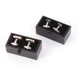 Two pairs of dress cufflinks: horseshoes and bullets, each pair in presentation box