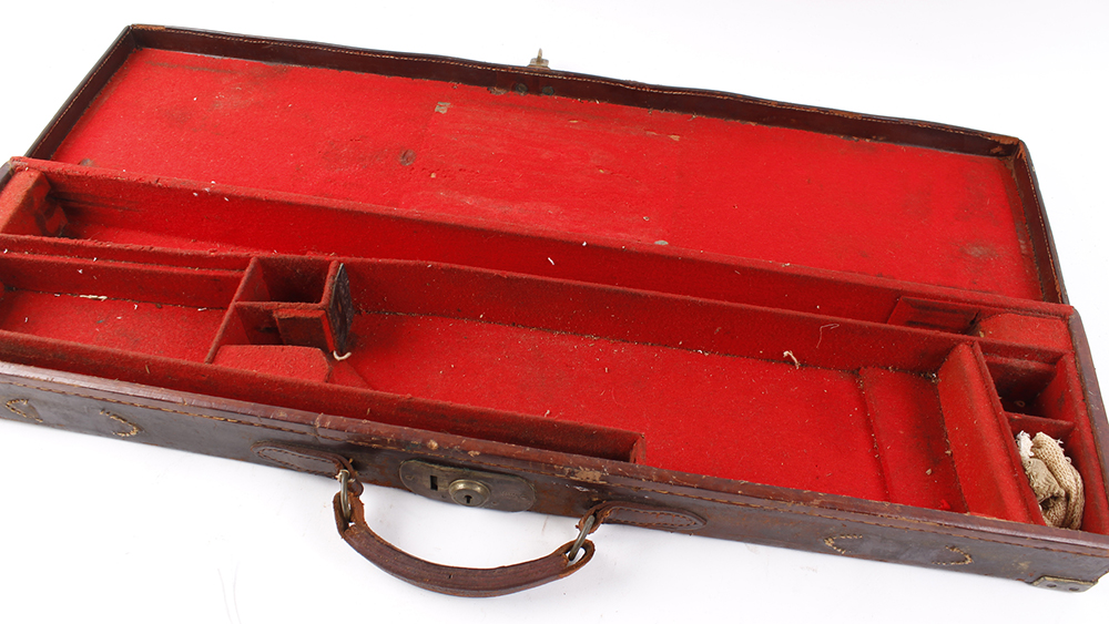 Red leather gun case, brass corners, red baize lined fitted interior, for up to 28 ins barrels - Image 3 of 3