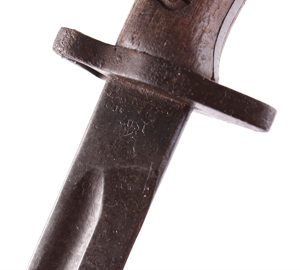 Enfield P1907 bayonet, 16 ins blade with broad arrow and other stamps, metal studded wood grips - Image 2 of 3