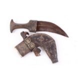 Arabian Jambia with 5 ins ribbed blade (a/f) with decorated mount to studded wooden hilt,
