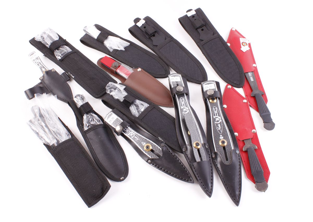 Bag containing large quantity of throwing knives