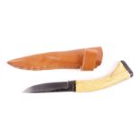 Custom made hunting knife, 4¾ ins single edged blade, stag antler grip, in tan leather sheath,