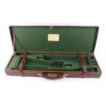 Oak and leather double gun case (straps replaced), brass corners,