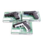 Three boxed Sig Sauer P226 airsoft pistols